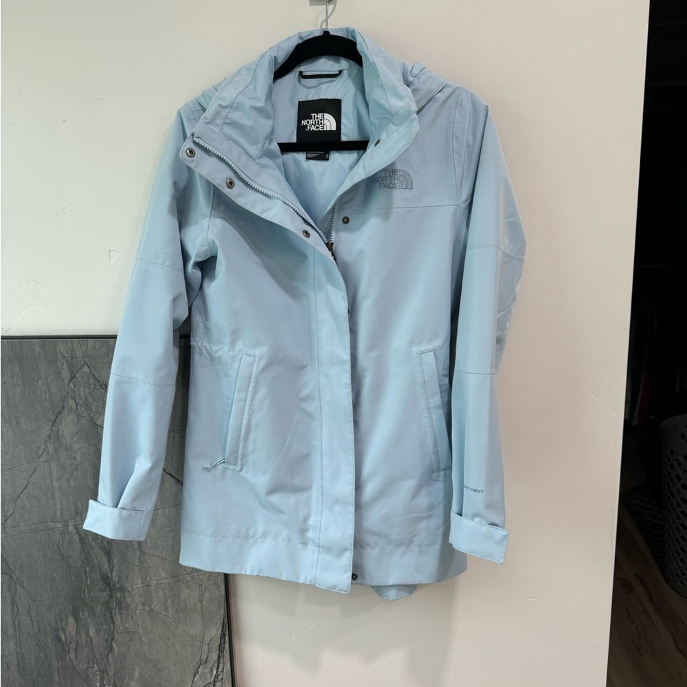 Light blue NorthFace raincoat